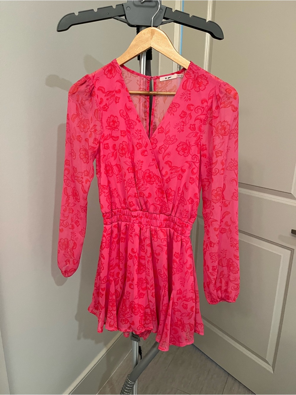 Francesca’s Pink Floral Wrap Romper